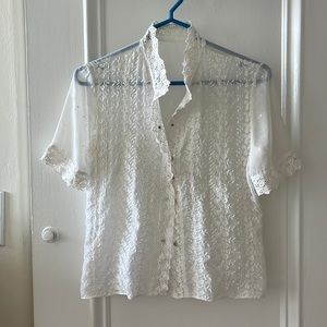 Vintage sheer blouse with lovely details.